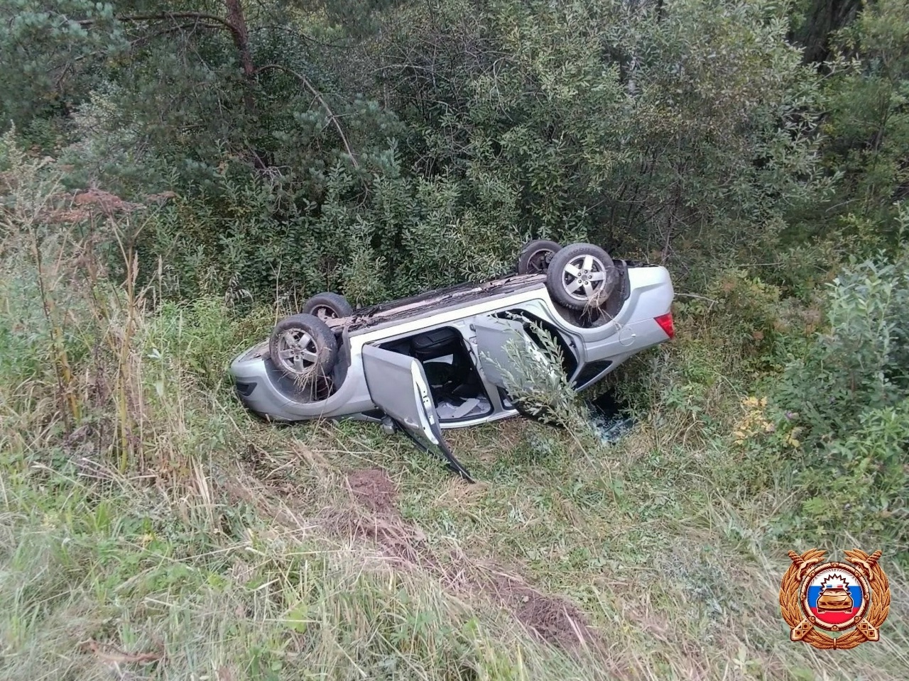 опрокинувшимся